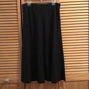 Black skirt mid calf length.